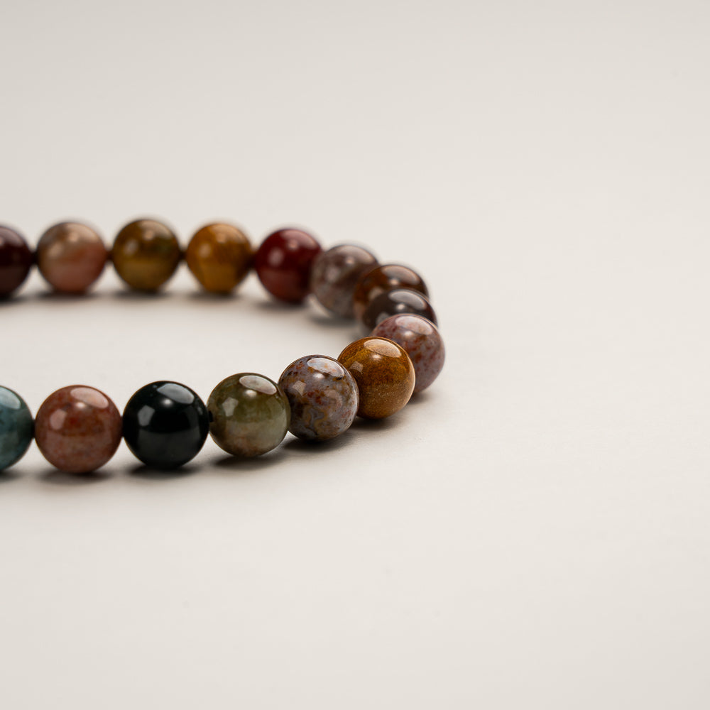Close-up of the Earth-Tone Jasper Bracelet, highlighting the distinct marbling and tone of each unique bead.