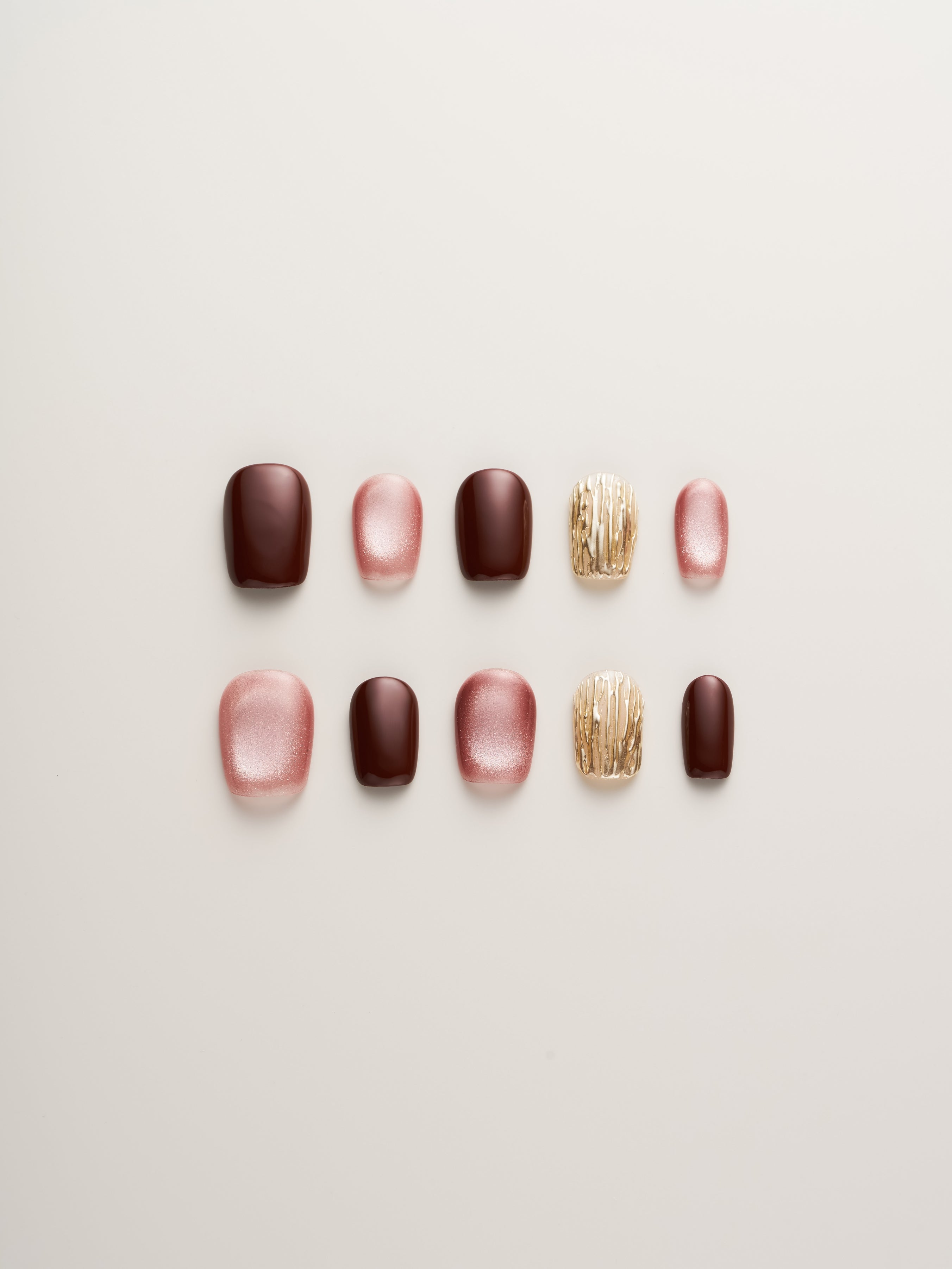 Luxe Rosewood & Gold Textured Square Press-On Nails displayed in various sizes, showcasing rich deep rosewood and shimmering gold accents, perfect for a sophisticated look.